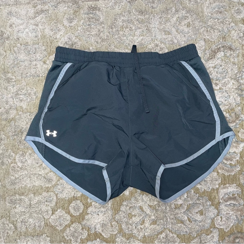 Under armour shorts, size medium. Fit small/medium